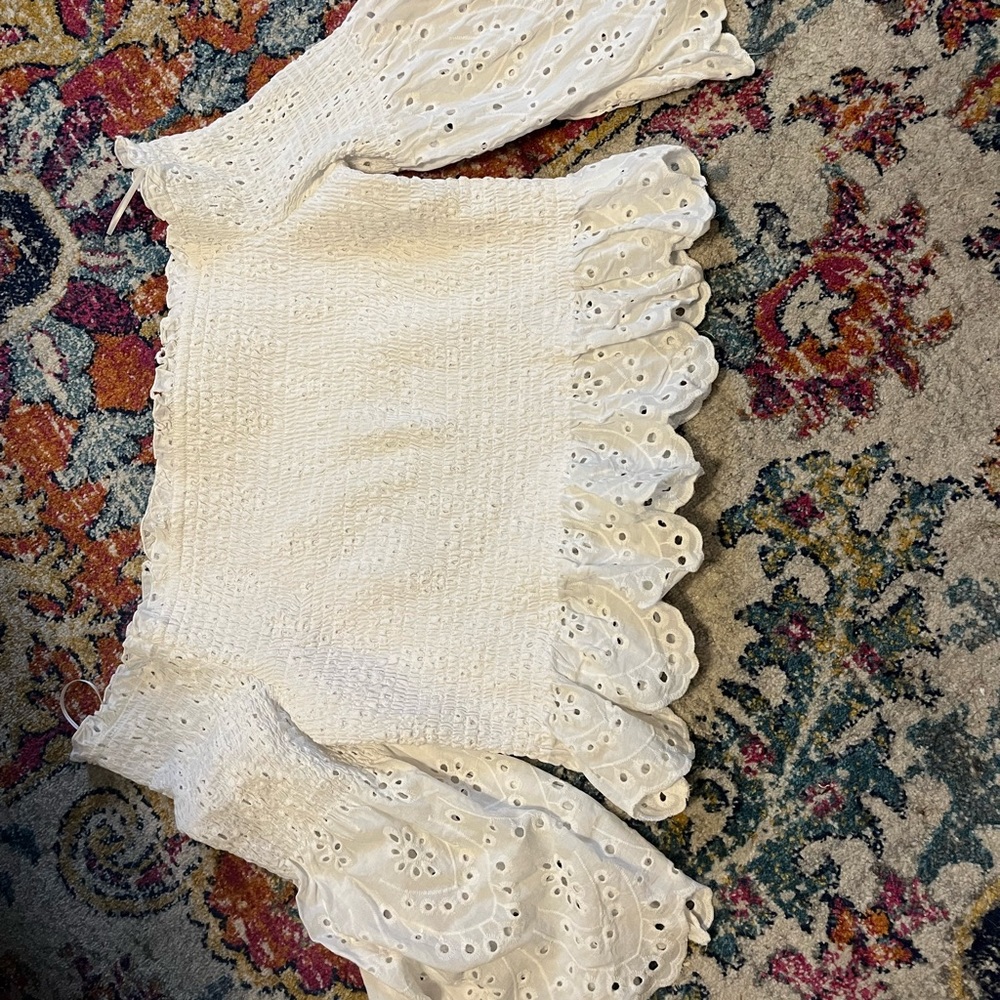 Xl off the shoulder smocked shirt. Embroidered bell sleeves Never worn like new.